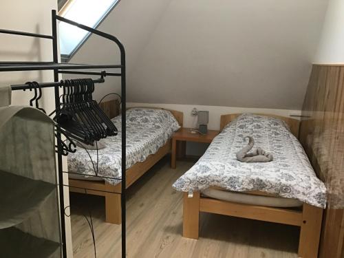 Postel nebo postele na pokoji v ubytování Citellus Apartman
