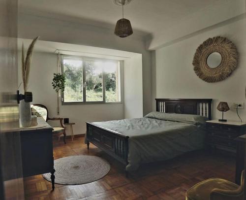 A bed or beds in a room at Primero Seixo antiguo