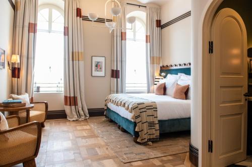 Postel nebo postele na pokoji v ubytování Soho House Tel Aviv