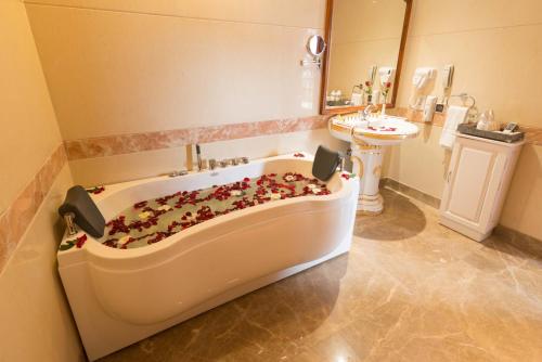a bathroom with a bath tub filled with puppies at Regency Angkor Hotel in Siem Reap