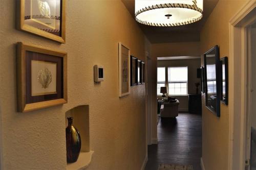 a hallway with a ceiling with a vase on the wall at The Gateway in Grand Forks