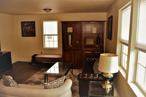 a living room with a couch and a table at The Gateway in Grand Forks