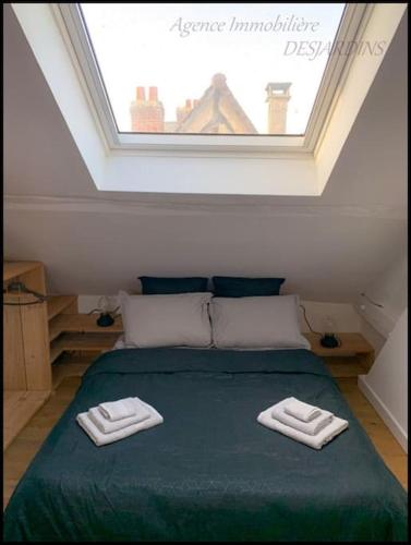 Posteľ alebo postele v izbe v ubytovaní La Normandie by Minnie