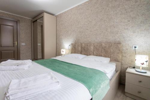 Ένα ή περισσότερα κρεβάτια σε δωμάτιο στο Ninia's Apartment