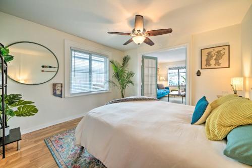 a bedroom with a bed and a ceiling fan at Portland Floating Home Getaway with Sauna! in Portland