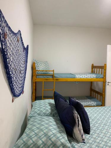 Een bed of bedden in een kamer bij Pousada Bravo