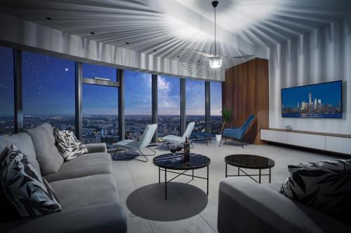 Гостиная зона в In The Sky - Apartamenty w Sky Tower
