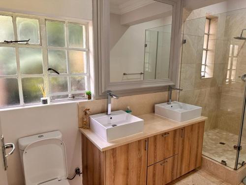 Bilik mandi di WOODS GUEST HOUSE