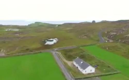 an aerial view of a house in a field at Malin Head SolasTobann ArtHouse Room 1 En-suite in Malin Head