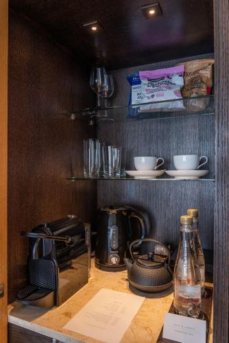 a kitchen with a counter with a toaster and a toaster at Palacio Duhau - Park Hyatt Buenos Aires in Buenos Aires