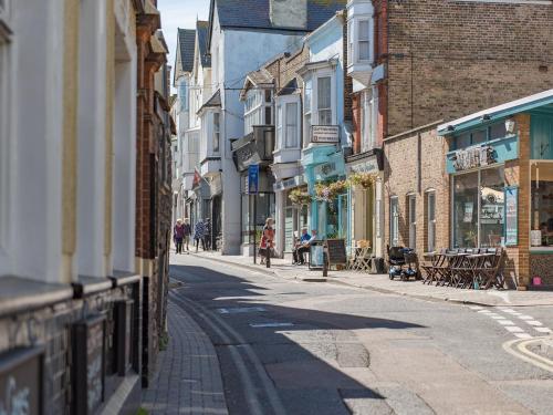 an empty city street with people walking down the street at Apartment 9 - Uk42740 in Whitstable