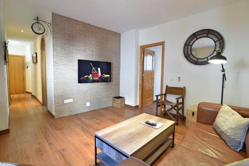 TV a/nebo společenská místnost v ubytování Apt del Conde Old town