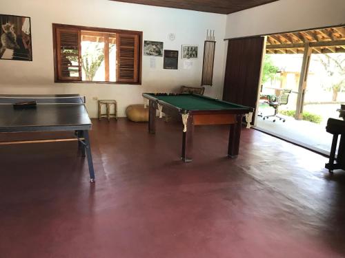 Meja biliard di Espaço Sr Churras famílias são bem vindas Temos berço