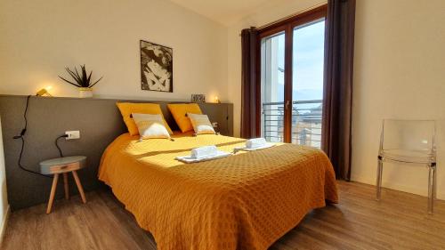 Postel nebo postele na pokoji v ubytování Sole del Lago