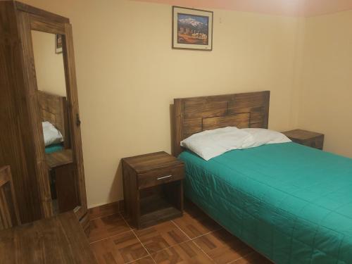 Ein Bett oder Betten in einem Zimmer der Unterkunft Beliz Inn