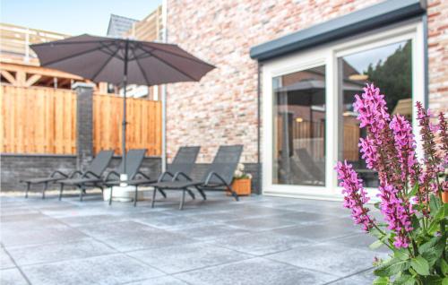 StavenisseにあるMarijoyのパティオ(椅子、傘付)