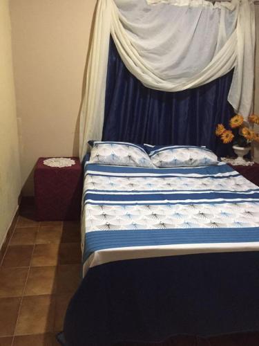 Cama o camas de una habitación en Hospedaje Doña Elida