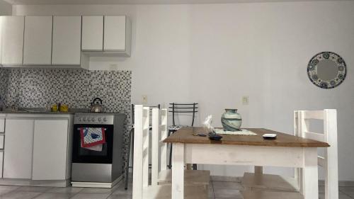 Kuchyň nebo kuchyňský kout v ubytování Súpercomodo