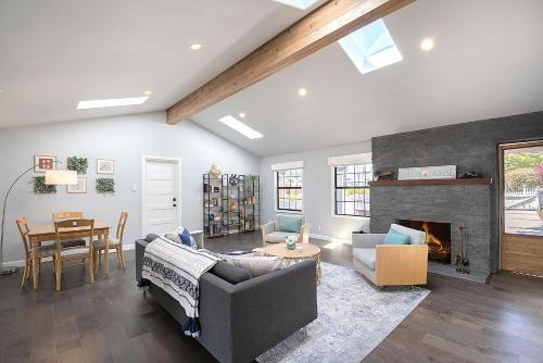 a living room with a couch and a fireplace at 3849 La Vista Portola home in Del Rey Oaks