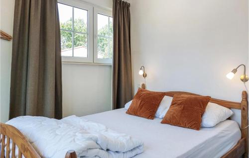 Кровать или кровати в номере 3 Bedroom Amazing Home In Baarland