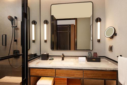 Ένα μπάνιο στο Four Points by Sheraton Yiyang
