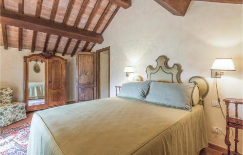a bedroom with a large bed in a room at Vista San Lorenzo in Ampinana