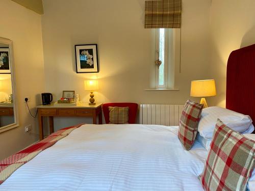Una cama o camas en una habitación de The Craven Arms