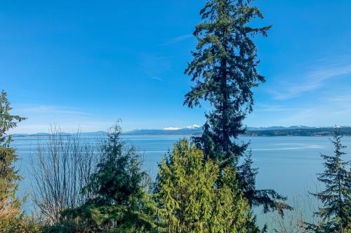 a view of the water from the shore of a lake at Port Susan Bay - A in Sunny Shore Acres
