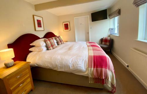Una cama o camas en una habitación de The Craven Arms