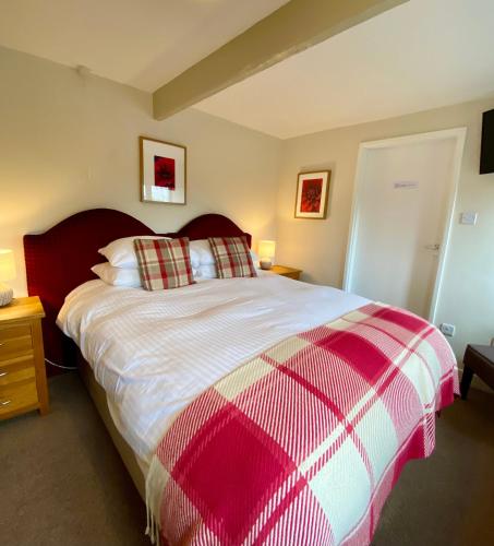 Una cama o camas en una habitación de The Craven Arms