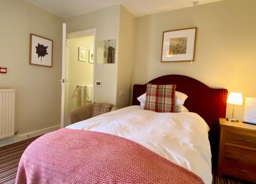Una cama o camas en una habitación de The Craven Arms