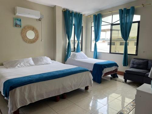 Cama o camas de una habitación en Reef Hostel Manta