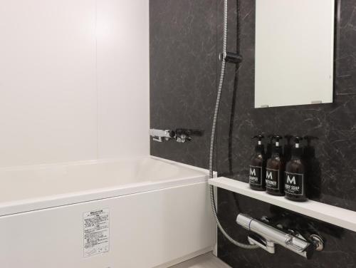 Ванная комната в HOTEL M's EST KYOTO STATION SOUTH