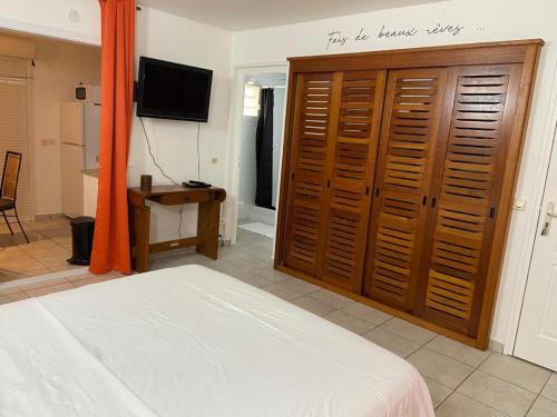 Llit o llits en una habitació de Doux rêve