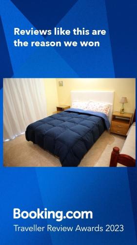 a poster of a bedroom with a bed in a room at MAR & ARENA in Puerto Madryn