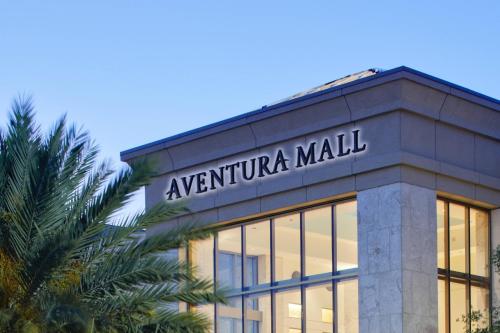 a building with a sign on top of it at JW Marriott Miami Turnberry Resort & Spa in Aventura