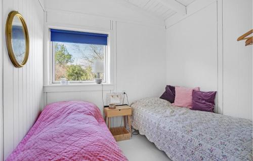 Postel nebo postele na pokoji v ubytování 3 Bedroom Gorgeous Home In Tisvildeleje