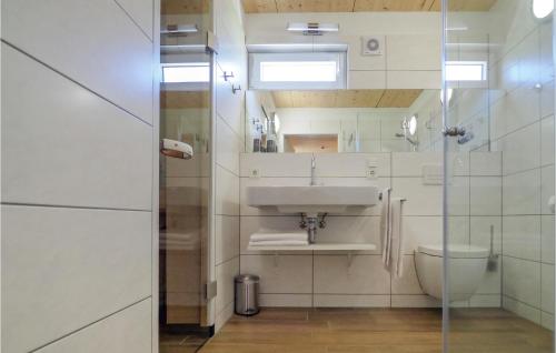 a bathroom with a sink and a toilet at Ferienhaus 4 Wolfschlucht in Prüm