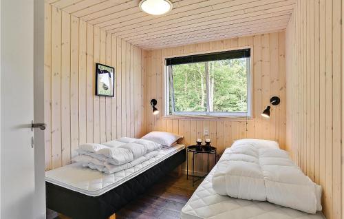 Voodi või voodid majutusasutuse Lovely Home In Frederiksvrk With Kitchen toas
