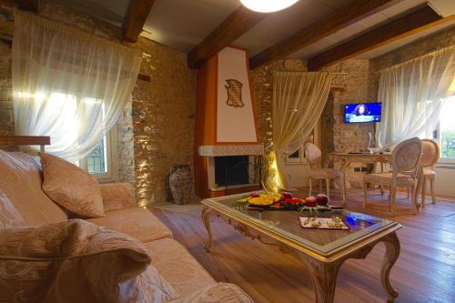 Posezení v ubytování Oste del Castello Wellness & Bike Hotel