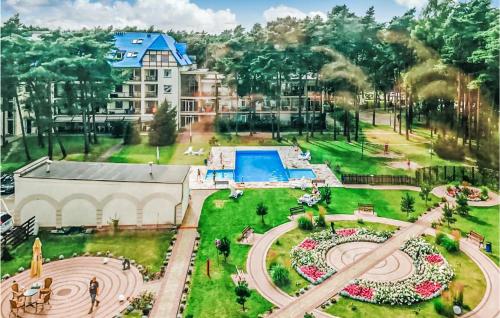 an aerial view of a park with a fountain at 3 Bedroom Lovely Apartment In Lukecin in Łukęcin