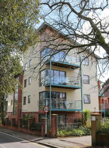 an apartment building with a balcony on a street at Southampton Serviced Apartments in Southampton
