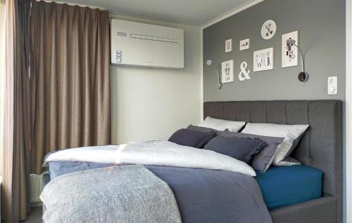 Ένα ή περισσότερα κρεβάτια σε δωμάτιο στο Statendam 12 Oh Laak