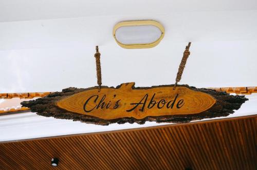a sign that says girls adored hanging on a wall at Chi Homestay #4 in Hue
