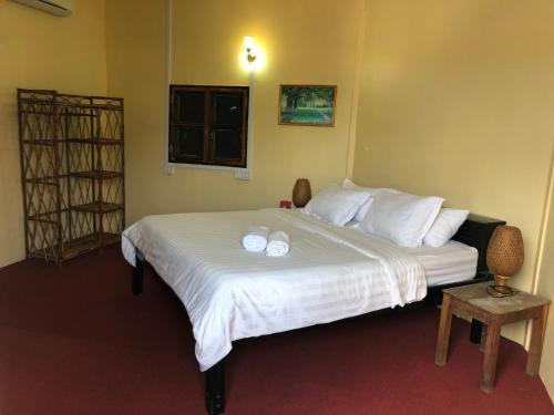 Llit o llits en una habitació de Sofinny Motel 2