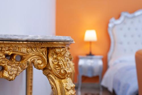 Postel nebo postele na pokoji v ubytování Casa Del Melograno