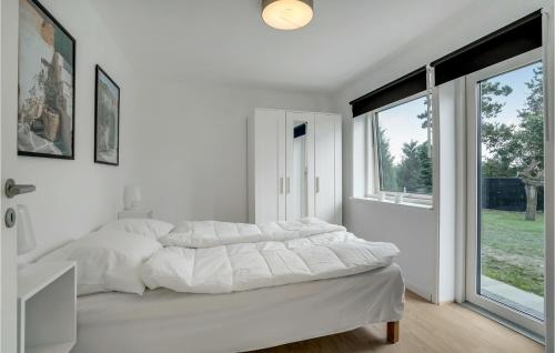 Postelja oz. postelje v sobi nastanitve 3 Bedroom Nice Home In Lundby
