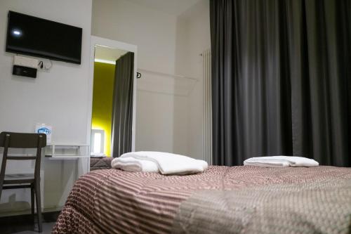 Postel nebo postele na pokoji v ubytování La Dimora Del Re