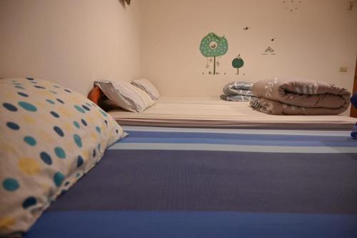 Cama o camas de una habitación en Carlos Backpacker