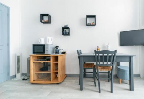 TV a/nebo společenská místnost v ubytování Le Venise - appartement design - centre ville - parcs